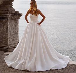 Simple Sleeveless Wedding Dress 2024 Strapless Pockets Satin A-Line Women Bride Gown Beach Princess Vestido de Noiva