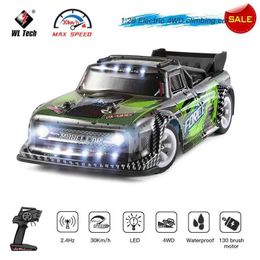 Diecast Model Cars WLtoys 284131 1 28 4WD 2.4G Mini RC Racing High Speed Off Road Remote Control LED Light Drift Alloy Truck Boys Toy Childrens Gift J240417