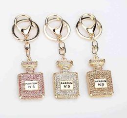 Keychains Creative Fashion Rhinestone Keychain Perfume Bottle Key Chains Female Bag Car Key Pendant Line Up Birthday Gift T2209093086738