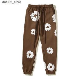 Men's Pants 2024 European and American street cotton sweatpants Kapuk foam printed plush loose sweatpants Unisex jogger Wreath Design Q240417