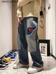 Pantaloni da uomo harajuku gambe larghe jeans pantaloni uomini amano il cuore oversize in denim dritta buttton cargo pantaloni lunghi streetwear dent nuovo q240417