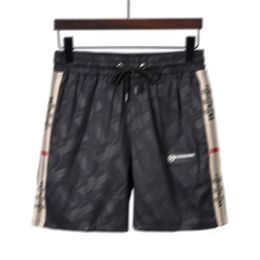 Men's new fashion letter print swim shorts casual loose sports men's golf summer drawstring striped beach pants High street trend hip hop best-selling shorts D42