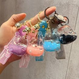 New Oil in Hand Cat Flowing Sand Drifting Bottle Keychain Female Cute Creative Couple Car Exquisite Internet Red Pendant