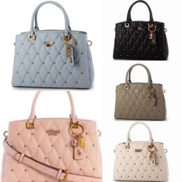 Handbag Designer Hot Selling 50% Off Shoulder Bags 2023 New Solid Colour Rivet Large Capacity Tote Bag Public Document Handheld One Shoulder Crossbody Womens