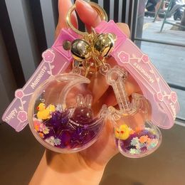 New Purple Duckling Oil in Liquid Drifting Sand Bottle Keychain Female Cute Creative Book Bag Cartoon Hanger