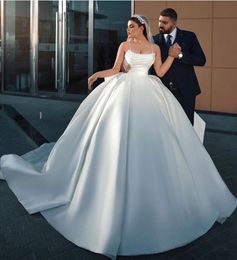 Luxury Satin Spaghetti Straps Strapless Ball Gown Wedding Dress Beading Pearls Ruched Top princess Bridal Gowns embroidered With Delicate bow