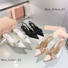 Miui 2024 Diamond Bow Ladies Mui Mui Sunglasses Heel Shoes New Style Pointy Ribbon Out Ladies Banquet Wedding Crystal Mui Mui High Heels Sandals 60