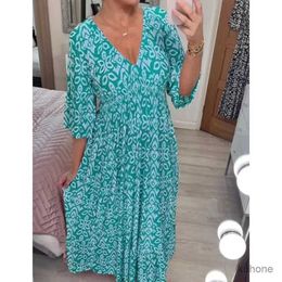 Vestidos casuais básicos 2024 Vestido casual de decote casual bohemiano de verão Mulheres embrulham roupas de praia de verão de férias de férias elegantes Lady Lady