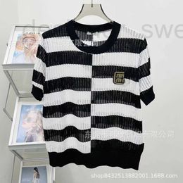 Women's T-Shirt Designer round neck hollowed out striped letter knit T-shirt short sleeved women's top 2024 early spring new style P1OG