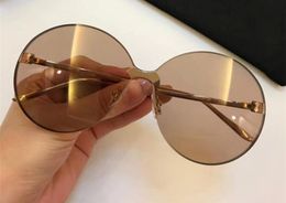 Luxury 0353 Designer Sunglasses For Women Fashion Sunglasses Wrap Sunglass Frameless Coating Mirror Lens Carbon Fiber Legs Summer 4552007