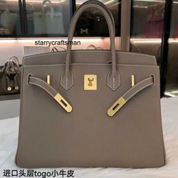 Women Luxury Handbag L High end Layer TOGO Cowhide Handbag 2023 New Type Bag Womens Genuine Leather Pattern Temperament BK