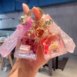 New acrylic internet celebrity small house with oil flowing sand drift bottle keychain, cute female bag, exquisite keychain