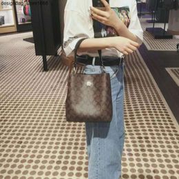 High Quality 75% Discount Wholesale Sales 2024 New Womens Bag Classic Old Flower Kou Handheld Bucket Pvc Leather Single Shoulder Crossbody