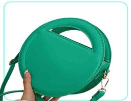 2022 Spring t Family Small Round Bag Fashion Simple Single Shoulder Diagonal Straddle Portable Women039s purses ladies luxury h5381635083