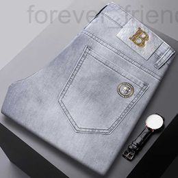 Men's Jeans designer Babaoshen 2024 Spring/Summer New Trend Hot Stamping Elastic Slim Fit Small Leg Long Pants Light Grey JQUF