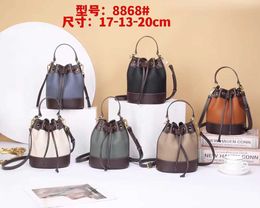 Handheld 2024 Small Bag for Womens Niche Design Cowhide Bucket Simple One Shoulder Crossbody