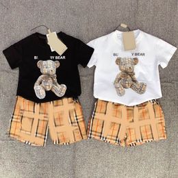 Clothing Sets British style short sleeved shorts set classic twopiece clothes trendy plaid pants for boys girls cartoon teddy bear printed tshirt Clothing CSD24041