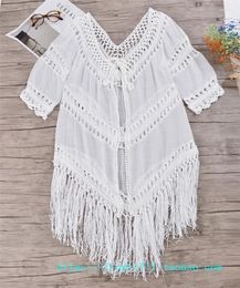 Women's Blouses Cross-Border Hand Crocheting Knitted Cut Out Bikini Blouse Tassel Beach Sun Protection Cardigan