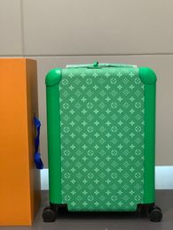 New designer green suitcase with wheels perfect for travel and carry-on luggage rolling trolley baggage cabin trunk
