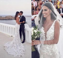 Sexy Backless Mermaid Wedding Dresses Luxury Beaded Lace Applique Sweep Train Custom Made Plunging V Neck Wedding Gown