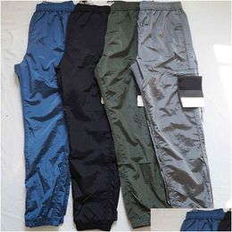 Mens Pants Esigners Stone Metal Nylon Pocket Embroidered Badge Casual Trousers Thin Reflective Island Size M-2Xl Drop Delivery Apparel Otw0S