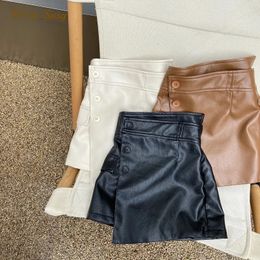 Fashion Girl Pu Leather Skirts Shorts Infant Toddler Child Button غير منتظمة قصيرة الساق على نطاق واسع بني أسود أبيض ملابس 1-7Y 240428