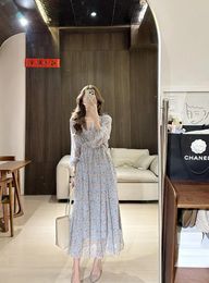 Casual Dresses 2024 Early Spring French Gentle Fragmented Flower Waist Slimming Long Sleeved V-neck Loose Lace Up Mid Length Dress