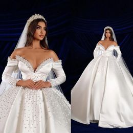 Gorgeous Pearls Beaded Dubai Ball Gown Wedding Dresses With Long Sleeves Pockets Off The Shoulder Sexy Formal Bridal Satin Vestidos De Novia YD