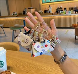 Classic Printed Coin Purse PU Leather Keychain with Tassel Portable Mini Wallet Storage Bags Fashion Designer Bag Charm Pendant4356893
