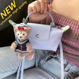 Luxury crossbody Difference Wholesale Original Perforated Bag Color Toiletry Version of Strap Mini Slight Dumpling Small Choose Shoulder women wallet purse 7350