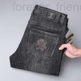 Designer di jeans maschile 2023 Nuovo per la luce Edizione coreana di lusso spessi piedi elastici Slimt fit Youth Blue and Black Pants H4MD