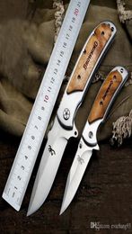 High quality Browning 338 Small Pocket Folding Knives 440C 57HRC Tactical Camping Hunting Survival EDC Tools Wood Handle Utilit9046693