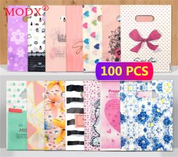 Bags 100Pcs Shopping Business Packaging Bag Plastic Gift Bags Printed Clothes Decoration Candy Cake Jewellery Birthday Gift Pouch M8888