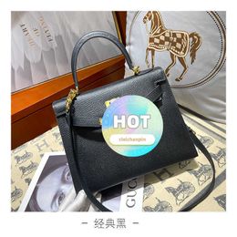 A kelyys 2024 New EP Palm Pattern Hard Kai Leather Handbag Fashionable and Versatile One Shoulder Crossbody Women's Bag