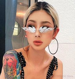 Luxury Fashion Fire Flame Women Sunglasses Retro Rimless Wave Sun Glasses Metal Shades For Eyewear UV4005136429