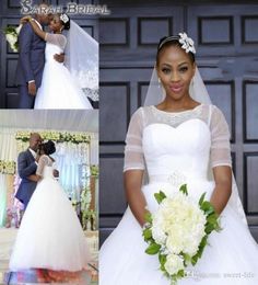 2020 South African Plus Size Wedding Dress Sheer Neck Beaded Bride Dresses Half Sleeves Dubai Bridal Gowns8637193