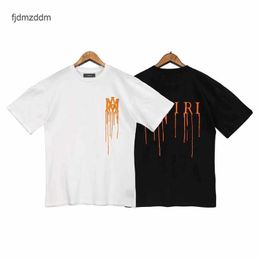 2022 Summer New Fashion Brand Am1ri Yellow Sand Fluid Letter Printed Mens and Womens Short Sleeve T-shirt