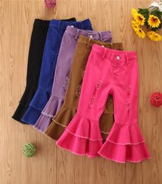 Fashion new Kids jeans Girl Flared Pants Button Denim Hole Trousers Children Falbala Jeans A45221085657
