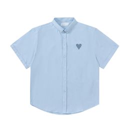 2024 Summer New Men's Short Sleeve Shirt Button White Solid Top Heart Mönster broderad skjorta Löst casual kvinnlig ruffian stilig skjorta t-shirt