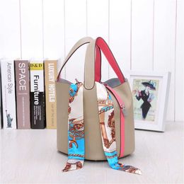 Tote bag genuine leather Water Bucket Bag Autumn New Genuine Leather Bag Womens Bag Litchi Pattern Handheld Womens Bag Vegetable Blue Small Bag Trendy