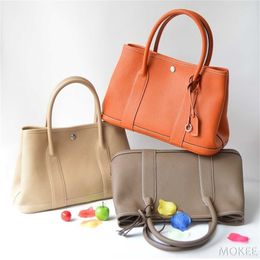 Tote bag genuine leather Korean version simple lychee textured top layer cow leather portable casual leather one shoulder womens bag garden bag