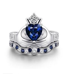 OMHXZJ Whole Solitaire Rings European Fashion Woman Man Party Wedding Gift Crown White Blue Zircon 18KT White Gold Ring RR6018371409