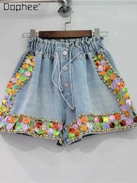 Frauenshorts handgefertigte perlengelegene große farbenfrohe Kristalle hohe Taille Weitbein-Denim-Shorts weiblich 2023 Sommer neue Beute Shorts Frauen Y240420