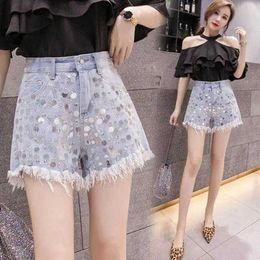 Kvinnors shorts 2024 Sommar Nya koreanska High midjeshorts Tunga industrin Jeans Loose and Slim A-Line breda benbyxor med TASSEL SHORTS Y240420
