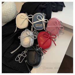 Children oval handbags kids Bows Pendant PU leather crossbody bags girls metals beades chain one-shoulder phone bag Z7804