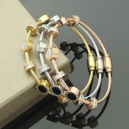 Römische Zahlenrunde schwarz-weiß-Schalen-Diamantarmbänder, Damen-Magnetschnallen Armbänder