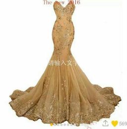 2017 Gold Sleeveless Backless Evening Gowns Sheer Neck Sequins Beaded Satin Floor Length Evening Dress Long Formal Dresses Sweep T5776587