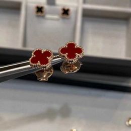 Designer charm High version Van small four leaf clover earrings female Gold thickened plating 18k rose gold natural red chalcedony white fritillaria