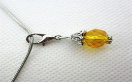 selling 50pcs golden month birthstone crystal dangle charms lobster clasp charms for glass floating lockets7843150