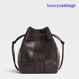 Womens Designer Cassette Cross-Body Bucket BotegaVeneta Mini/Small Sizes Intreccio Leather Cross-body Bucket Bag Interior Open Pocket Drawstring Closure WQHM